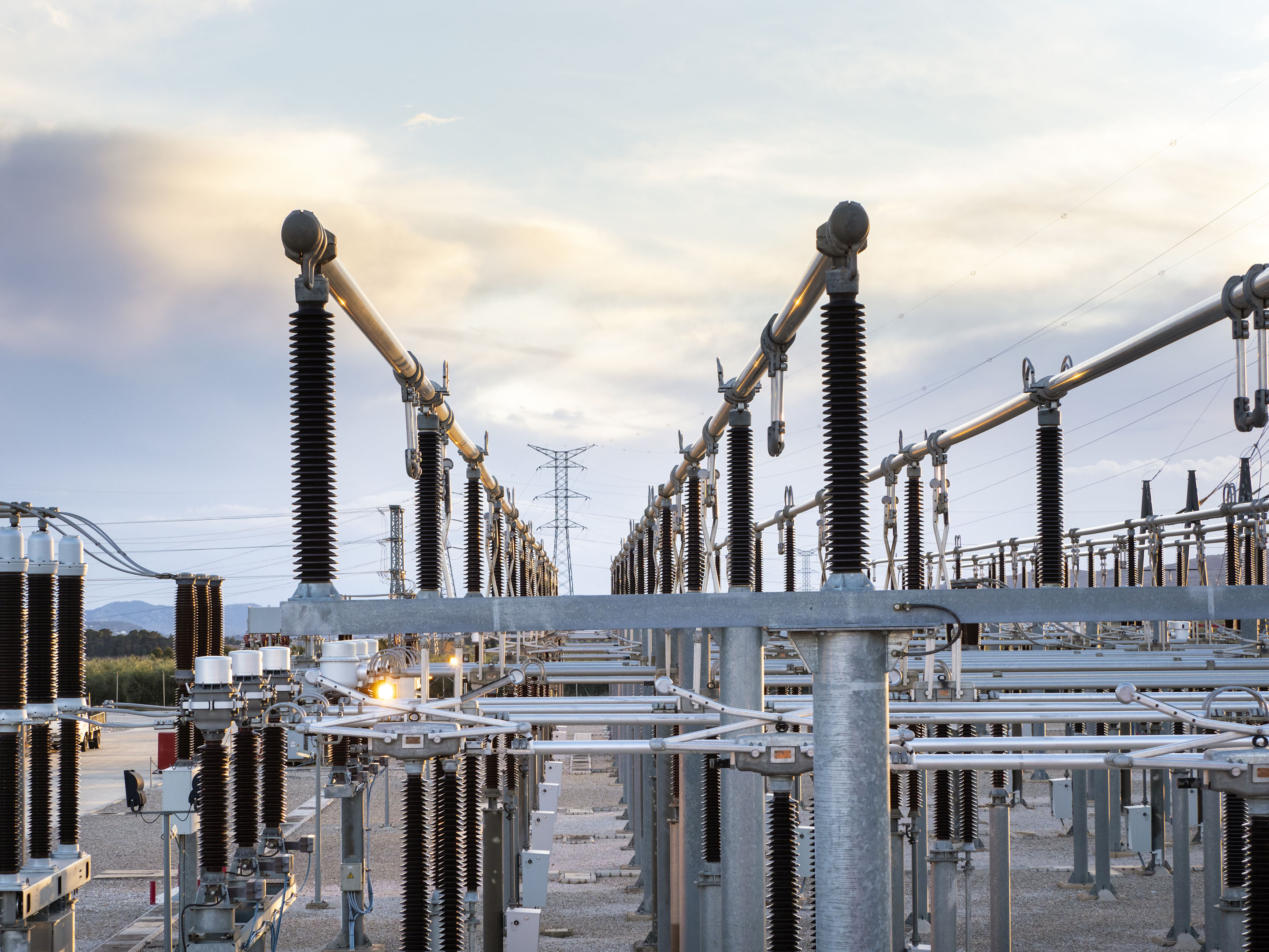 hon-high-voltage-substation-switchgear-insulators-dusk-1159224342.jpg