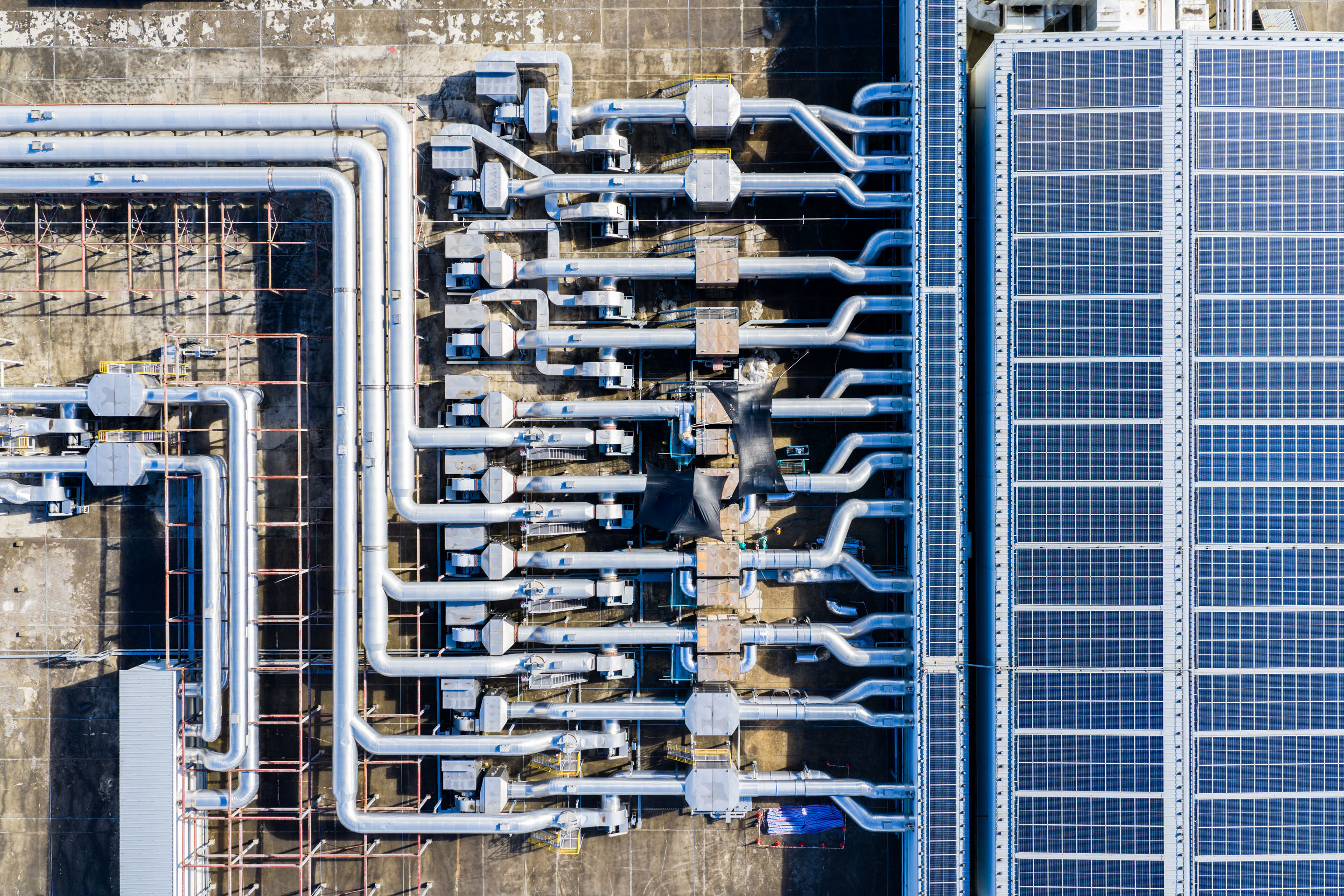 hon-aerial-rooftop-hvac-pipes-solar-panels-1778469673.jpg