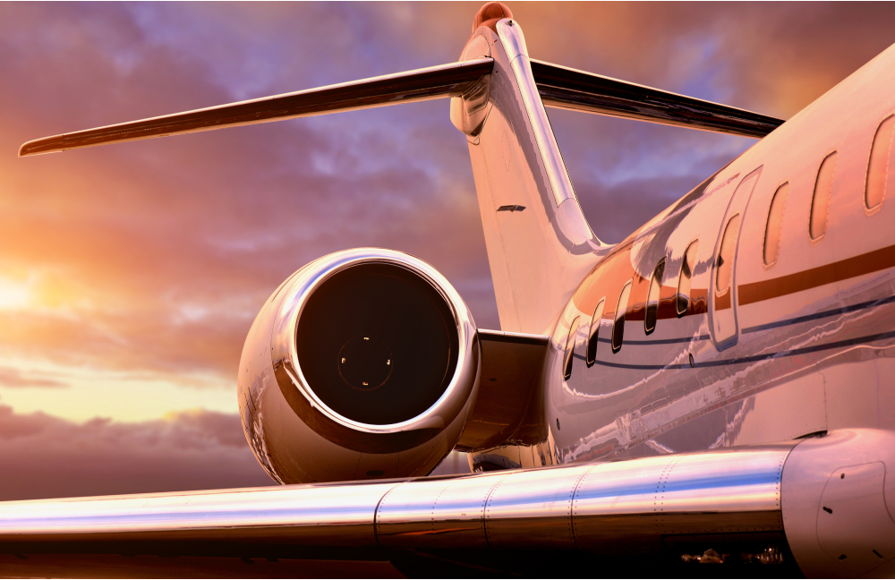 An airplane turbine in the purple sky